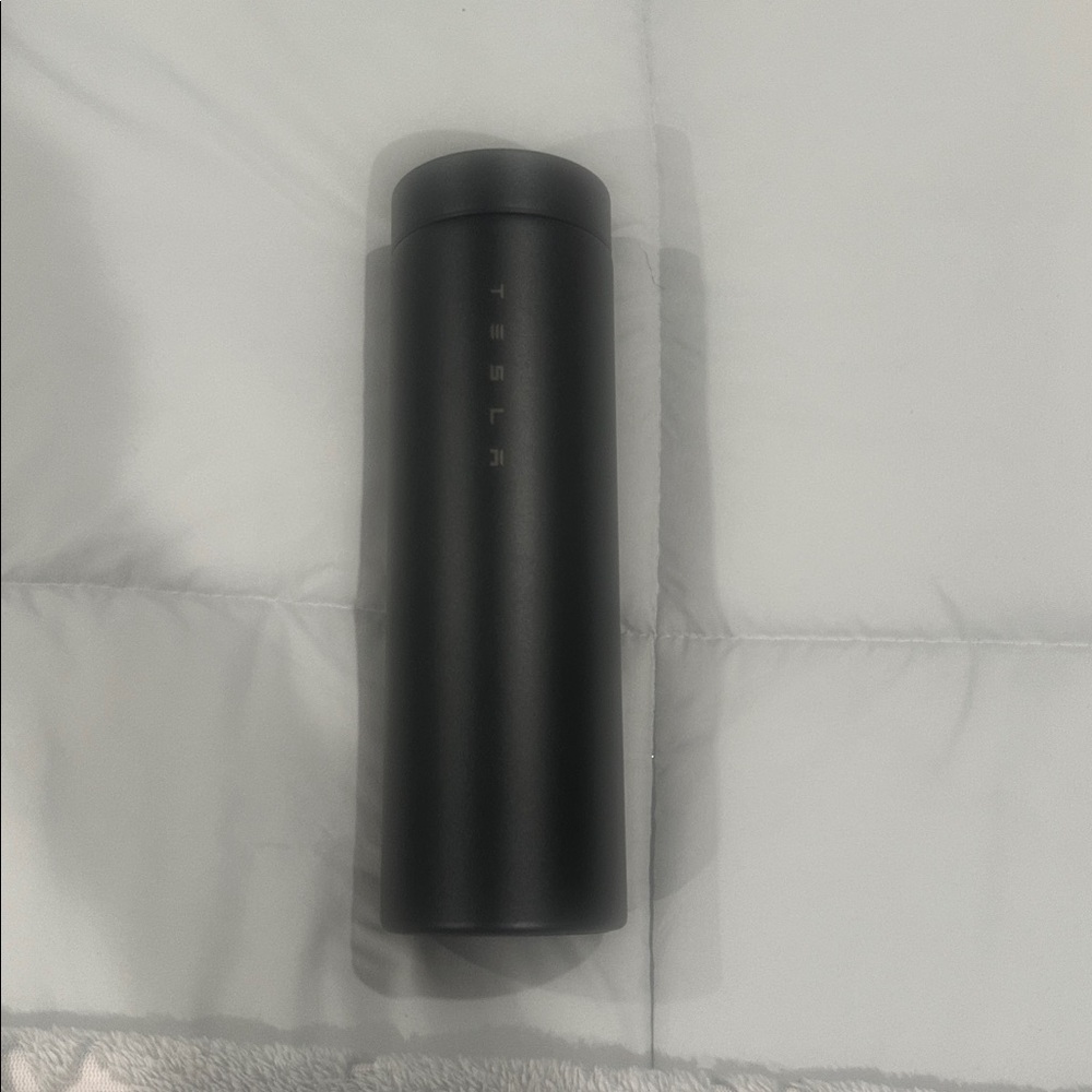 Tesla on the road Tumbler
